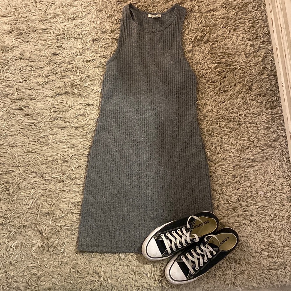 Midi length with a scoop neckline and tank cut size large runs small.